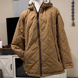 Free Country women ‘s Tan Quilted Puffer , this jacket is ready for winter .